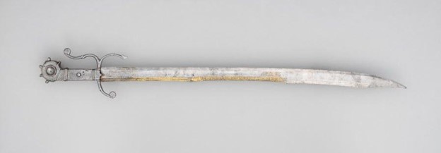 on a plain white surface is a falchion, one of the sword types